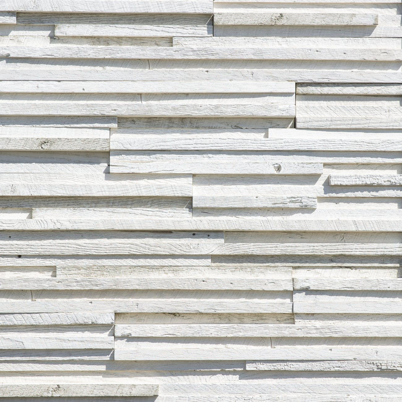 Eldorado Shore Breeze Rivenwood stone with realistic driftwood-style grain in soft tan and light gray tones