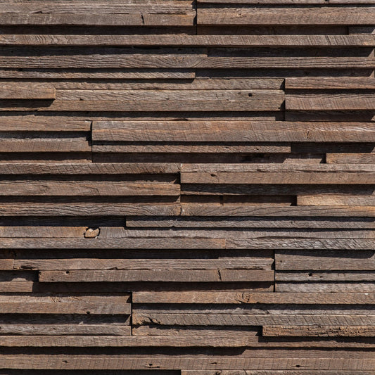 Eldorado Tawny Brown Rivenwood stone with warm brown woodgrain texture and natural knot detailing