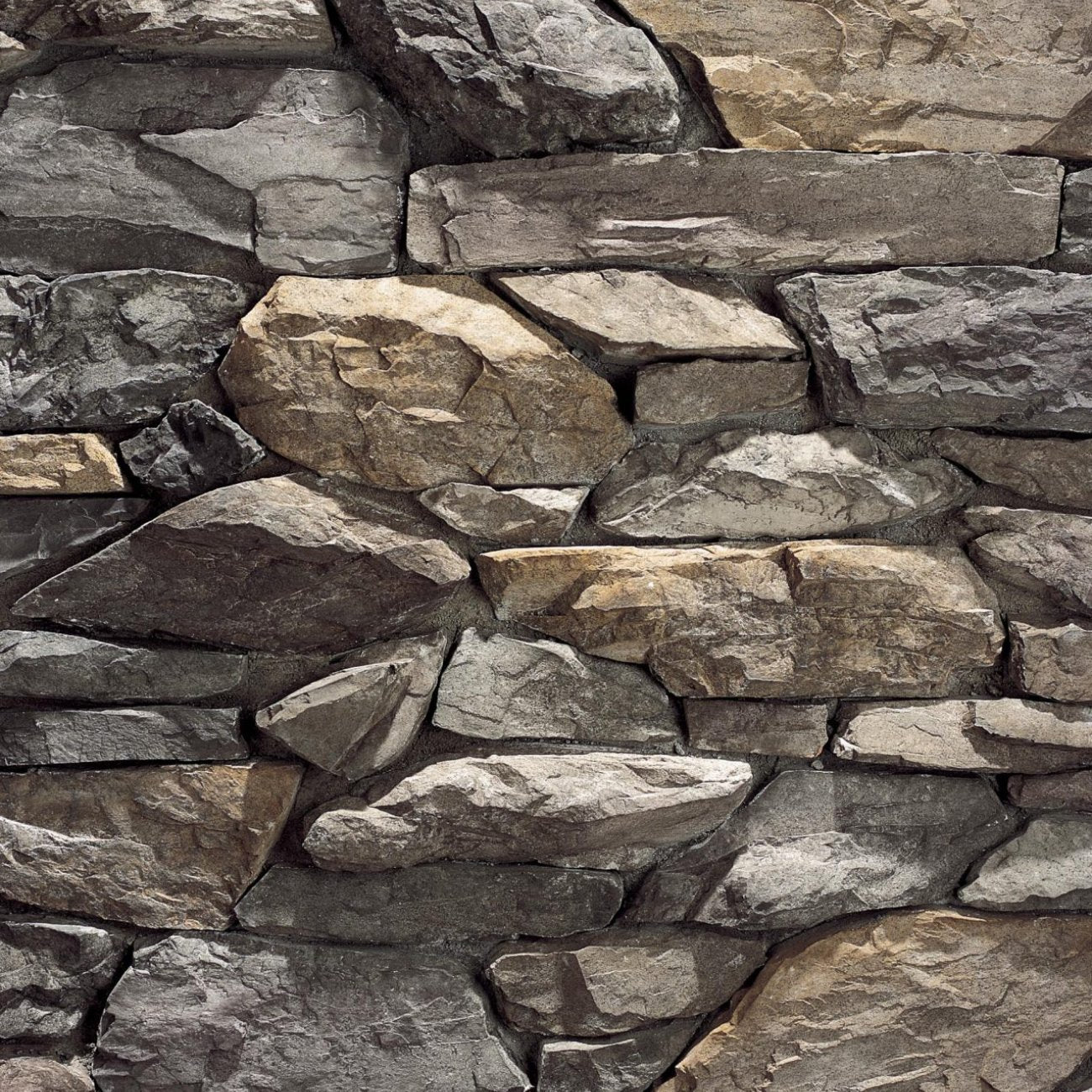 Eldorado Teton Shadow Rock with rugged, irregular stone faces in cool gray, weathered brown, and charcoal tones