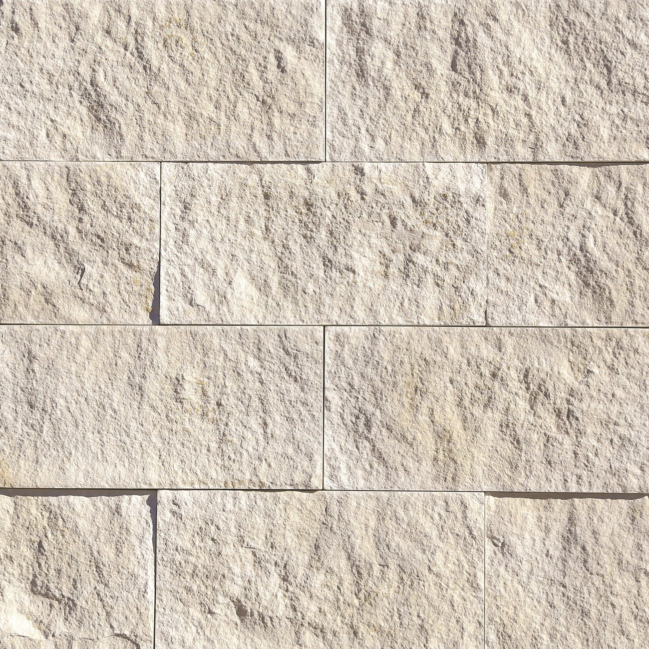Eldorado Whisper White Ridgetop18 panels in soft white and cream tones with layered, chiseled stone texture