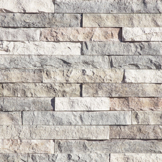 Eldorado Whitecap LedgeCut33 stone veneer in soft white and creamy neutral tones with a modern stacked-stone profile
