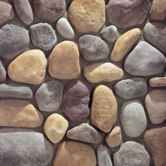 Eldorado Yakima River Rock with rounded stones in soft gray, taupe, brown, and charcoal tones