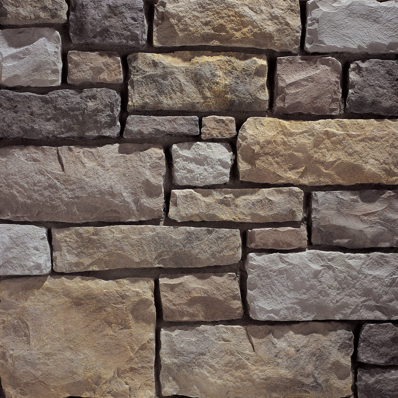 Eldorado York Limestone stone veneer in soft gray and charcoal tones with refined, chiseled limestone texture