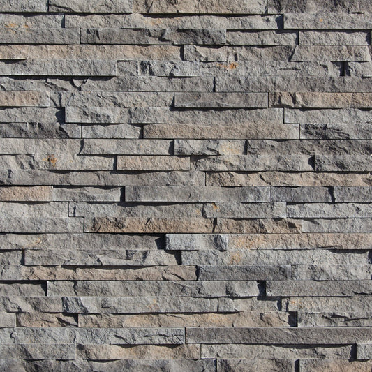 Eldorado Zinc European Ledge stone veneer in cool gray and charcoal hues with linear, chiseled stone texture