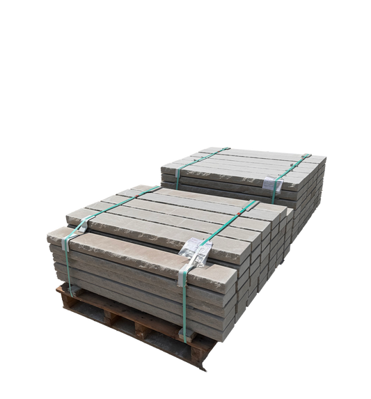 Representative rockfaced limestone sills stacked on a pallet; color and dimensions vary
