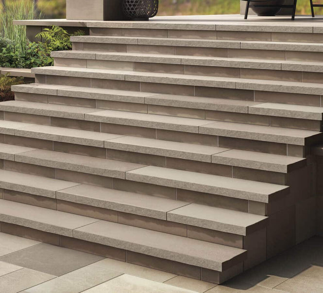 Representative smooth limestone stair treads; color and dimensions vary