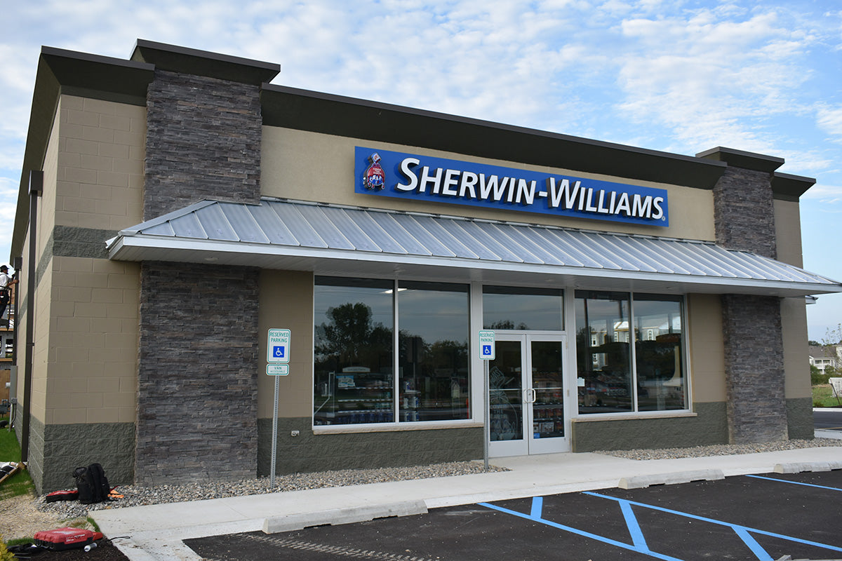Sherwin-Williams store front with a clear sky background