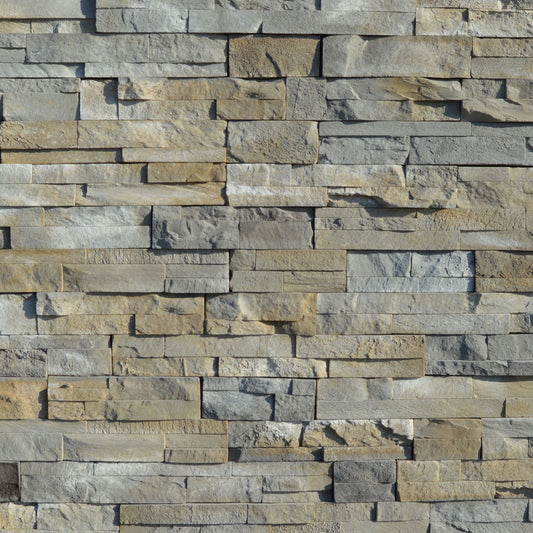 Pattern of stacked stone tiles in various shades of gray and brown.