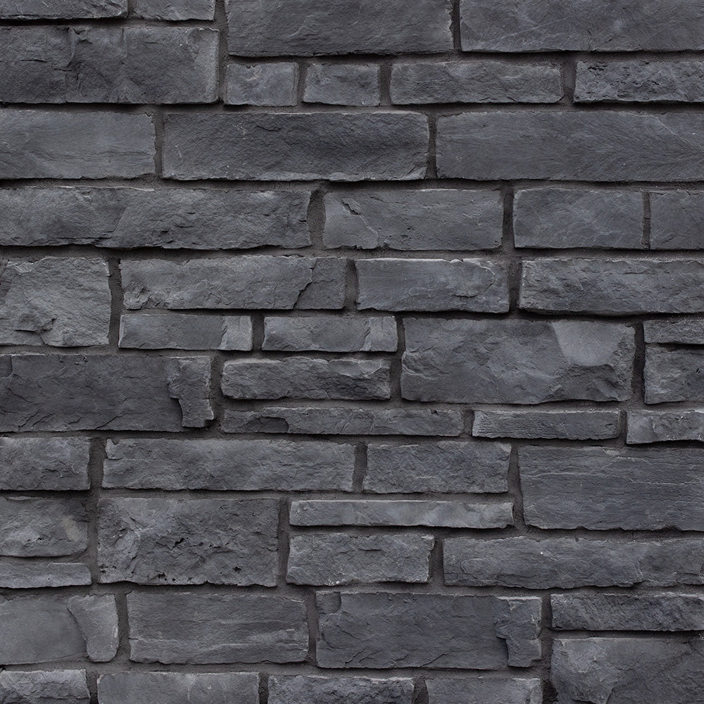 Prestige Black Onyx Old County Ledge stone veneer with dark layered texture