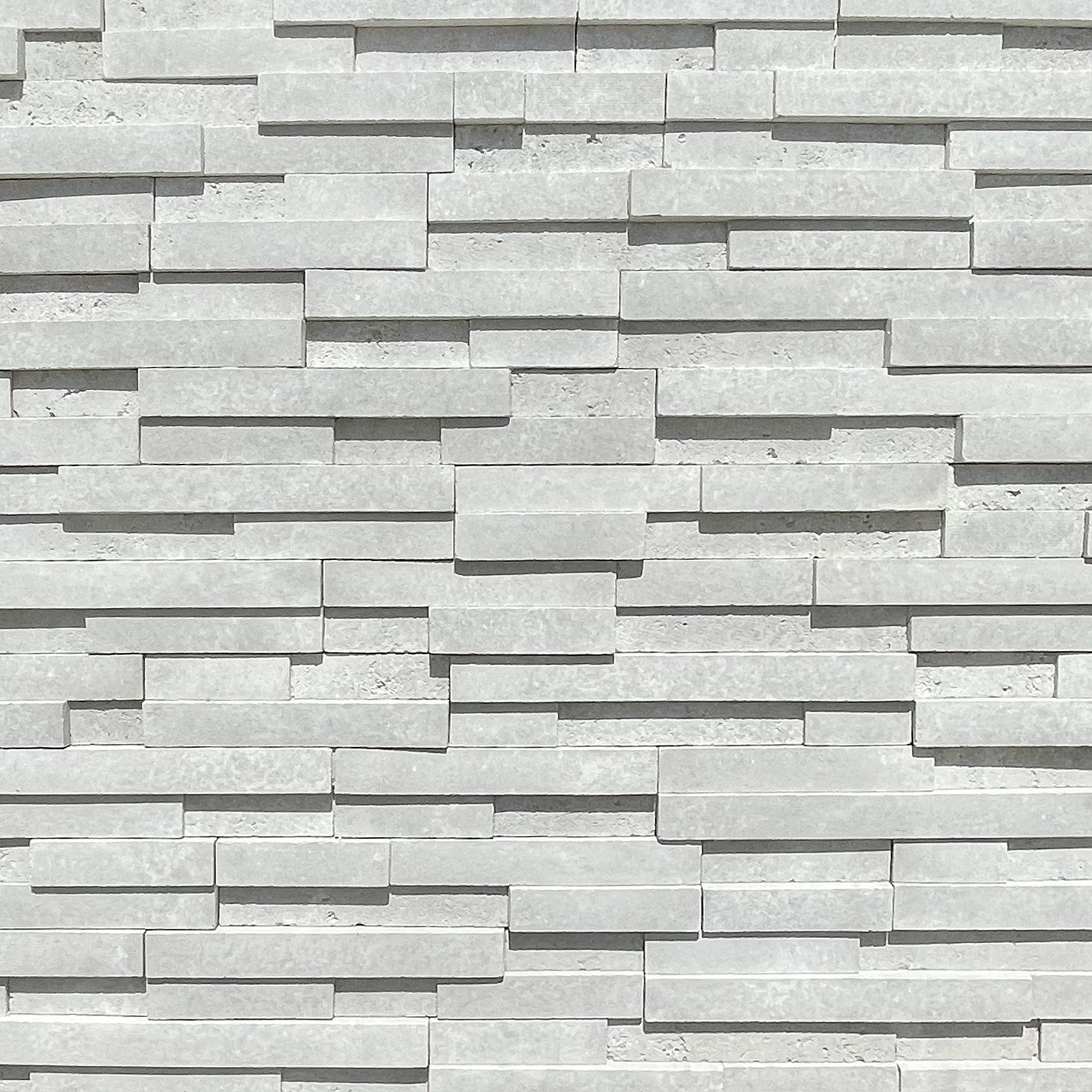 Prestige White Onyx Designer Cut stone veneer with clean linear design