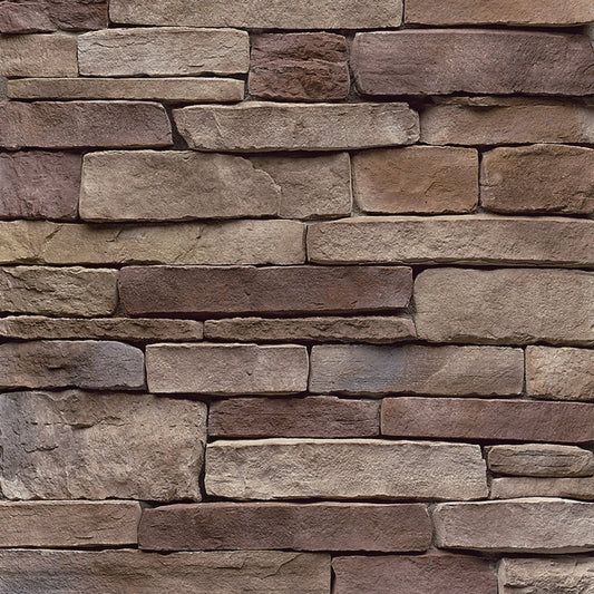 StoneCraft Bucktown Ledgestone stone veneer featuring warm earth tones, layered split-face texture, and dimensional stacked-stone character.