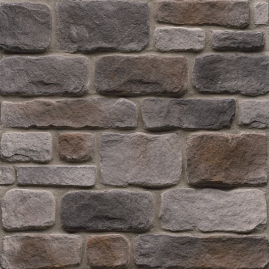 StoneCraft Grey Cobble stone veneer featuring rounded cobblestone shapes, cool gray tones, and textured Old World masonry character.