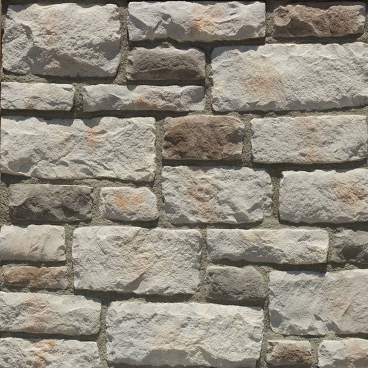 StoneCraft Hamilton Heritage stone veneer featuring gray and warm neutral tones, timeworn textured faces, and classic Old World masonry character