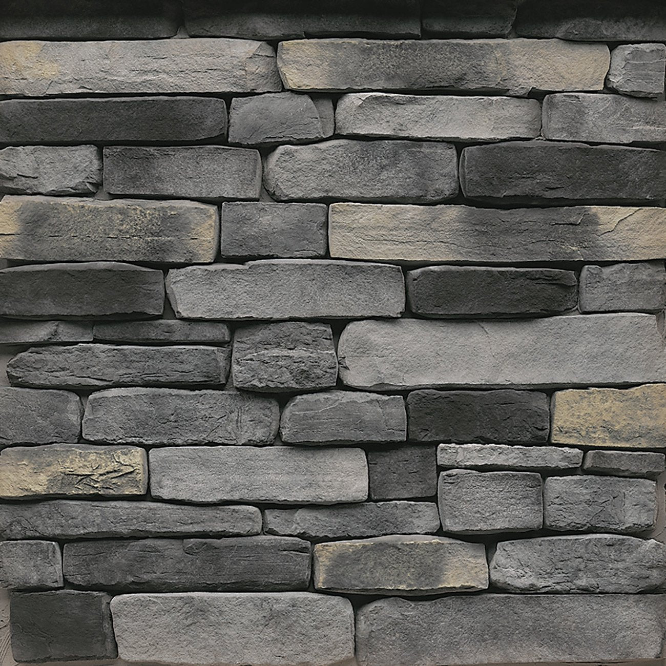 StoneCraft Kingsford Ledgestone stone veneer featuring cool gray tones, layered split-face texture, and dimensional stacked-stone character
