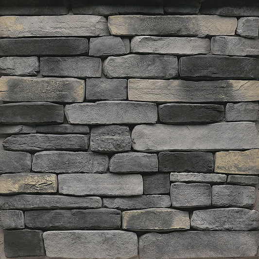 StoneCraft Kingsford Ledgestone stone veneer featuring cool gray tones, layered split-face texture, and dimensional stacked-stone character