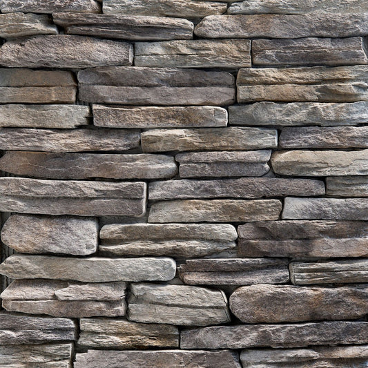 StoneCraft Mineral Ridge Laurel Cavern Ledge stone veneer featuring cool gray mineral tones, rugged ledgestone texture, and dimensional quarry-style stone character.