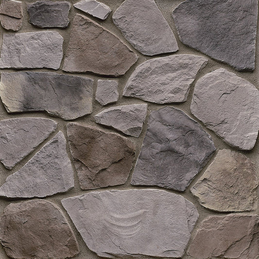 StoneCraft Pennsylvania Fieldstone stone veneer featuring rugged irregular shapes, earthy brown and gray tones, and authentic rustic fieldstone texture.