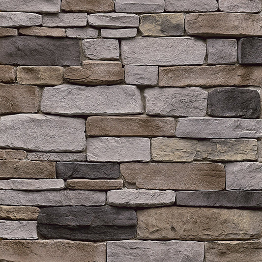 StoneCraft Pennsylvania Ledgestone stone veneer featuring earthy brown and gray tones, layered split-face texture, and dimensional stacked-stone character.
