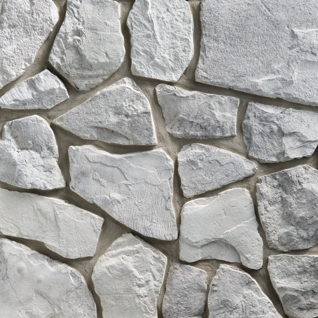 StoneCraft Silver Summit Fieldstone stone veneer featuring rugged irregular shapes, cool gray tones, and authentic rustic fieldstone texture.