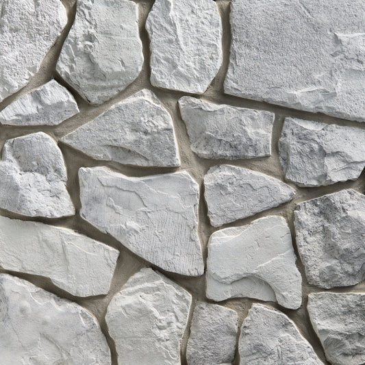 StoneCraft Silver Summit Fieldstone stone veneer featuring rugged irregular shapes, cool gray tones, and authentic rustic fieldstone texture.