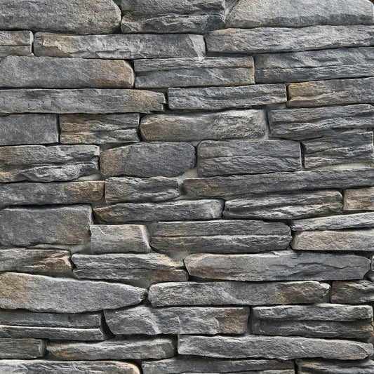 StoneCraft Steel Valley Laurel Cavern Ledge stone veneer featuring deep gray tones, rugged ledgestone texture, and dimensional quarry-style stone character.
