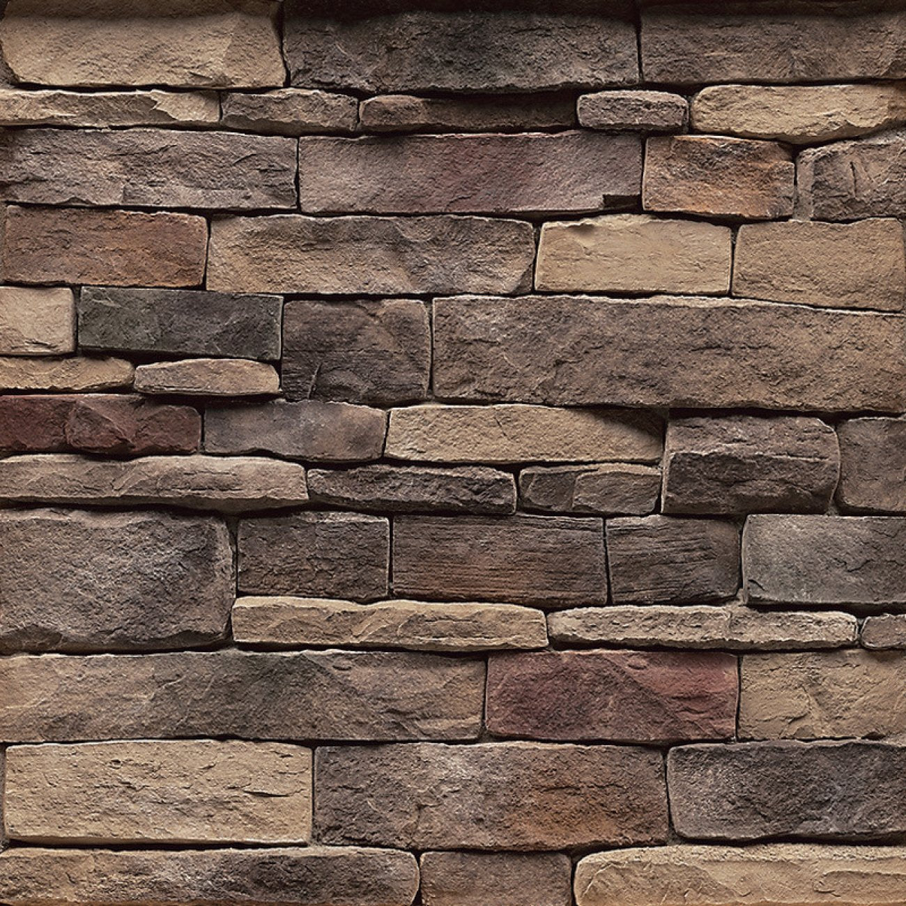 StoneCraft Tennessee Ledgestone stone veneer featuring warm earth-tone color variation, layered split-face texture, and dimensional stacked-stone character.